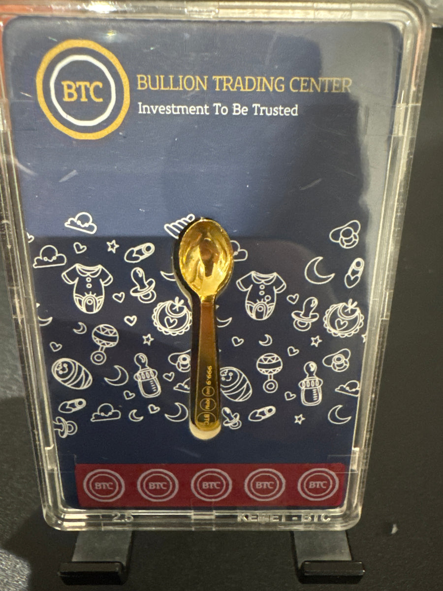 2.5 grams fine gold spoon